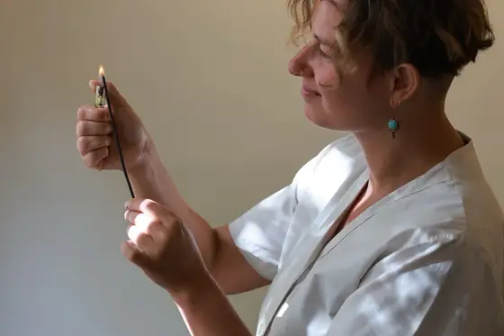 Lighting a candle before the treatment